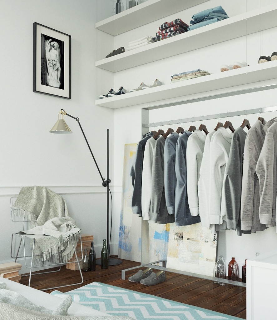 Открытый гардероб в спальне экономит место за счет отсутствия дверей