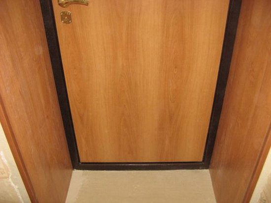 Пример обшивки входной двери панелями МДФ изнутри