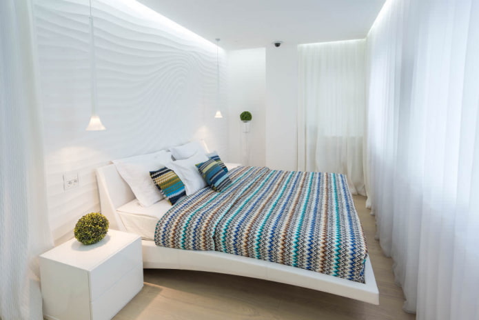 спальня декорированная белыми 3д-панелями